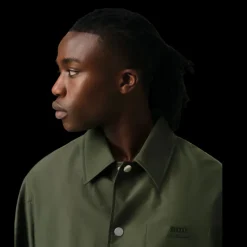 Blouson boutonné AMI Paris toile nylon kaki col chemise poche poitrine logo