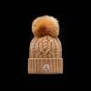 Bonnet MONCLER laine  cachemire torsade beige pompon logo