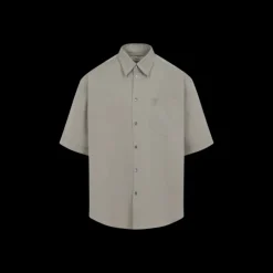 Chemise manche courte AMI Paris coton beige gris poche poitrine broderie cœur logo