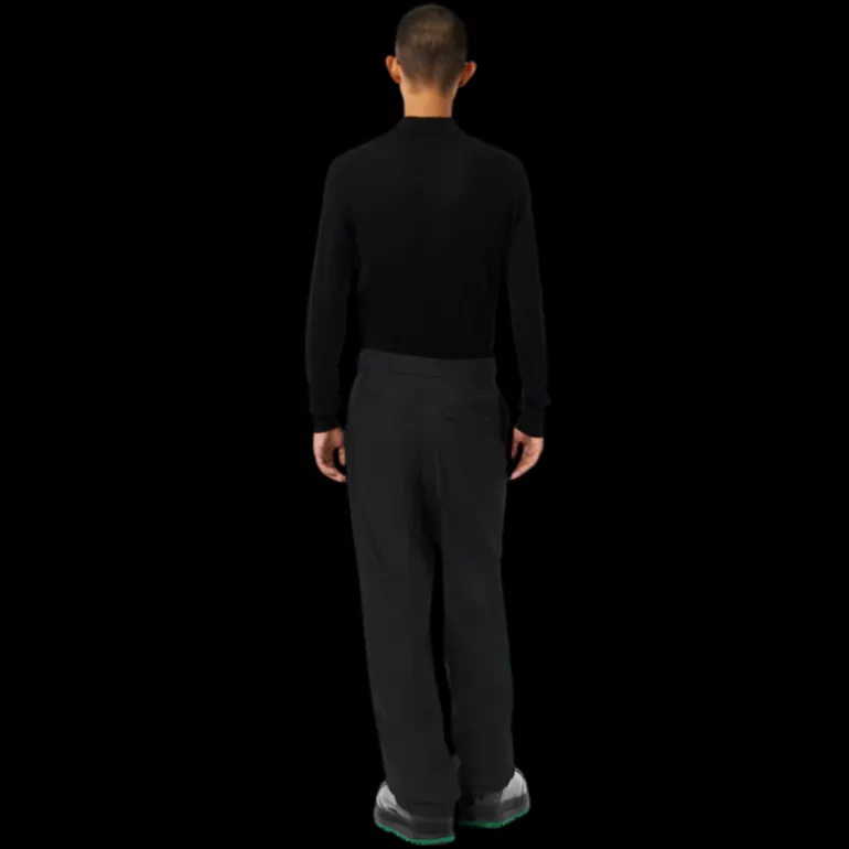 Fashion Show LACOSTE Pantalon droit à pince twill laine vierge mélangée noir ceinture logo crocodile