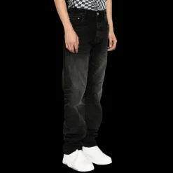 Jean flare AMIRI Stack denim noir délavé