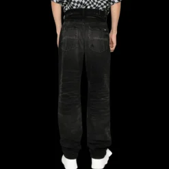 Jean flare AMIRI Stack denim noir délavé