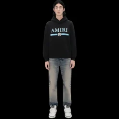 Jeans AMIRI coupe droite coton denim italien bleu vieilli vintage