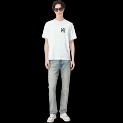 Jeans AMIRI Slim denim coton bleu clair délavé