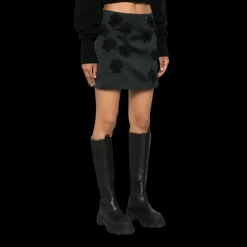 Jupe courte MONCLER nylon satin noir broderie fleurs