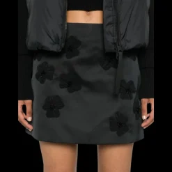 Jupe courte MONCLER nylon satin noir broderie fleurs