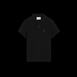 Polo manche courte AMI Paris piqué coton noir broderie cœur rouge