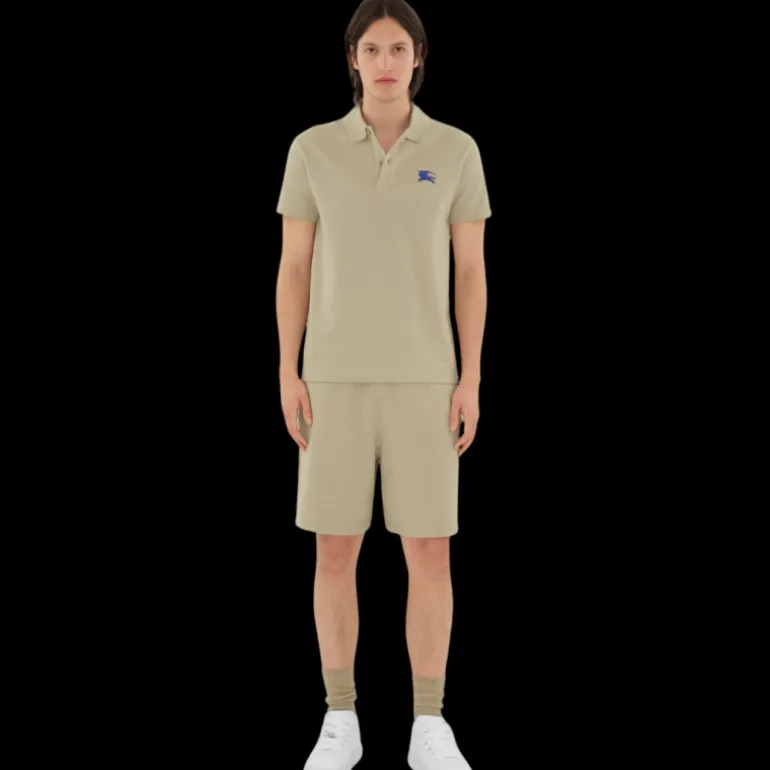 Polo manche courte BURBERRY coton piqué beige broderie chevalier bleu