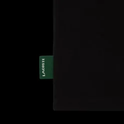 Polo manche courte LACOSTE coton piqué noir grosse étiquette