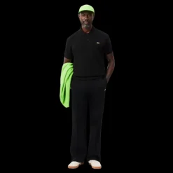 Polo manche courte LACOSTE coton piqué noir grosse étiquette