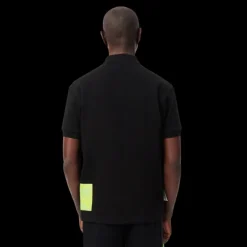 Polo manche courte LACOSTE coton piqué noir grosse étiquette