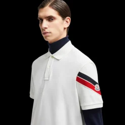 Polo MONCLER ample coton piqué blanc bande tricolore manche