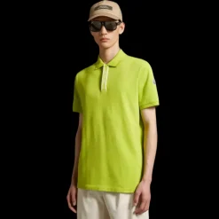 Polo MONCLER piqué de coton vert anis motif logo blanc col