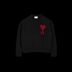 Pull col rond AMI Paris laine mérinos noir broderie gros cœur rouge