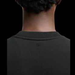 Sweatshirt AMI col rond molleton coton bio non gratté noir logo cœur rouge