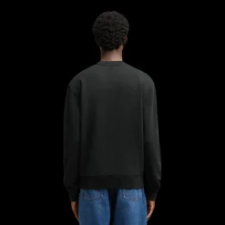 Sweatshirt AMI col rond molleton coton bio non gratté noir logo cœur rouge
