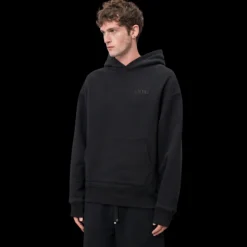 Sweat-shirt capuche AMIRI hoodie coton noir broderie logo ton sur ton