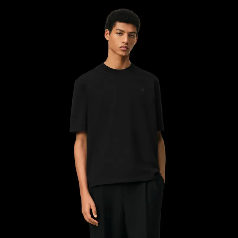 T-shirt AMI Paris col rond jersey de coton bio noir broderie cœur ton sur ton