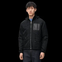 Veste matelassée à capuche LOEWE nylon noir poche cuir anagramme